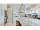 Bright kitchen with granite countertops, stainless steel appliances, and a subway tile backsplash at 9403 9Th Nw Ave, Bradenton, FL 34209