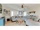 Comfortable living room with a large sectional sofa, neutral tones, and bright, natural light at 9403 9Th Nw Ave, Bradenton, FL 34209