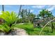 Backyard playground with swing set and lush greenery at 9403 9Th Nw Ave, Bradenton, FL 34209