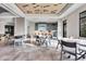 Amenity space with a kitchen, dining tables, and lounge area perfect for gatherings at 3025 Veneto Ct, Bradenton, FL 34211
