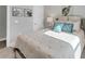Bedroom featuring queen size bed, turtle decor and a lots of natural light from the window at 3025 Veneto Ct, Bradenton, FL 34211