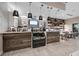 Well-lit cafe with modern design, tiled wall, pastry display, and table seating at 3025 Veneto Ct, Bradenton, FL 34211
