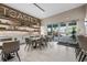Cafe interior with modern counter, decorative shelving, and outdoor patio access at 3025 Veneto Ct, Bradenton, FL 34211