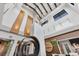 Stunning lobby featuring a soaring ceiling, modern lighting, and unique architectural elements at 3025 Veneto Ct, Bradenton, FL 34211