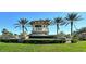 Entrance sign for Sandhill Preserve on Palmer Ranch surrounded by manicured landscaping at 11200 Whimbrel Ln, Sarasota, FL 34238