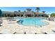 Community pool features a zero entry and a lounge area at 11200 Whimbrel Ln, Sarasota, FL 34238