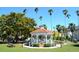 Charming gazebo in a green park setting, perfect for outdoor relaxation and community gatherings at 1150 Tarpon Center Dr # 1-C 103, Venice, FL 34285