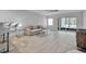 Living room featuring neutral tones, comfortable seating, and a bright atmosphere at 1150 Tarpon Center Dr # 1-C 103, Venice, FL 34285