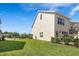 Well-maintained backyard and side view of this neutrally painted two-story home at 12017 Cranston Way, Bradenton, FL 34211