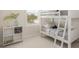 Charming bedroom with white bunk beds, window shutters, and ample natural light at 12017 Cranston Way, Bradenton, FL 34211