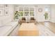 Bright living room with modern furniture, large windows, and stylish decor for comfortable living at 12017 Cranston Way, Bradenton, FL 34211