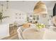 Bright living space features an open layout, natural light, and dining and living room areas at 12017 Cranston Way, Bradenton, FL 34211