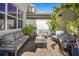 Charming outdoor patio with comfortable seating and shade from the Florida sunshine at 12017 Cranston Way, Bradenton, FL 34211