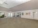 Spacious hallway provides access to the outside and an additional kitchen area at 154 Inlets Blvd, Nokomis, FL 34275