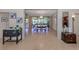 View of the living room, adjacent dining room, and bamboo floors, perfect for entertaining at 154 Inlets Blvd, Nokomis, FL 34275