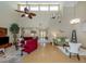Spacious living room with vaulted ceilings, fan, bamboo flooring, and open floor plan at 154 Inlets Blvd, Nokomis, FL 34275