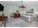 Bedroom with ceiling fan and art decor at 154 Inlets Blvd, Nokomis, FL 34275