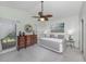 Bedroom with ceiling fan and large windows at 154 Inlets Blvd, Nokomis, FL 34275