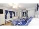 Spacious main bedroom features a comfortable bed and closet space, creating a relaxing retreat at 170 Edgewood Dr, Osprey, FL 34229
