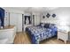 Spacious main bedroom features a comfortable bed and closet space, creating a relaxing retreat at 170 Edgewood Dr, Osprey, FL 34229