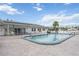 Beautiful community pool with ample seating and a well-maintained pool deck for relaxation at 170 Edgewood Dr, Osprey, FL 34229