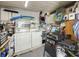 Functional utility room equipped with washer and dryer perfect for storage and laundry needs at 170 Edgewood Dr, Osprey, FL 34229