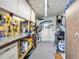 Functional utility room equipped with workbench, washer, dryer and lots of storage at 170 Edgewood Dr, Osprey, FL 34229