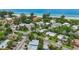 Gorgeous aerial view showcasing the luxurious homes and the pristine beach along the coastline at 202 75Th St, Holmes Beach, FL 34217