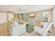 Inviting living room with stylish furnishings and plenty of natural light at 202 75Th St, Holmes Beach, FL 34217