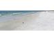 Beautiful beach with clear waters and white sand at 2124 Tamiami N Trl # 103, Sarasota, FL 34234