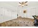 Spacious bedroom boasts ample closet space, neutral paint, hardwood floors, and modern finishes at 2460 Hillview St, Sarasota, FL 34239
