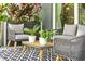 Cozy patio with stylish outdoor furniture and decorative plants, perfect for relaxing at 2460 Hillview St, Sarasota, FL 34239