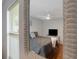 Bedroom featuring a full sized bed, ceiling fan, and window with natural light at 2710 93Rd E Ct, Palmetto, FL 34221