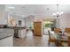 Dining area with large window overlooking the pool and lanai at 2710 93Rd E Ct, Palmetto, FL 34221