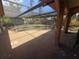 A covered patio leads to a pool that needs cleaning, set in a leafy area at 303 70Th Nw St, Bradenton, FL 34209