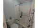 Bathroom features a walk-in shower, grab bars, and a toilet at 3237 Pine Haven Dr, Clearwater, FL 33761