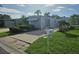 Charming residence with awning, mailbox, landscaping, and spacious driveway at 3324 Laurel Oak Way, Sarasota, FL 34237