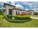 Charming single-Gathering home featuring a well-manicured lawn and a two-car garage at 3602 Secret Stroll Dr, Sarasota, FL 34240
