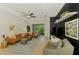 Spacious living room with ample seating, perfect for relaxing and entertaining guests at 3602 Secret Stroll Dr, Sarasota, FL 34240