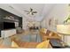 Expansive open-concept living area features contemporary decor, dining and kitchen, perfect for gatherings at 3602 Secret Stroll Dr, Sarasota, FL 34240