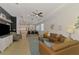 Bright open-concept living area with modern furnishings, dining area, and easy flow to the kitchen at 3602 Secret Stroll Dr, Sarasota, FL 34240