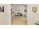 Open living space with tile floors, neutral walls, and bright natural light at 3602 Secret Stroll Dr, Sarasota, FL 34240