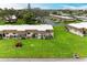 Aerial view showcasing a well-kept community with lush landscaping and manicured lawns at 3905 34Th Avenue W Dr # 36, Bradenton, FL 34205