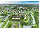 Gorgeous aerial view of a lovely neighborhood featuring lush green landscaping and well-maintained homes at 3905 34Th Avenue W Dr # 36, Bradenton, FL 34205