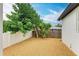 Low maintenance backyard with gravel and a privacy fence offering a secluded outdoor space at 4314 Des Plaines Dr, Sarasota, FL 34233