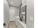 Well-lit laundry room with washer, dryer, mechanicals, and neutral walls at 4314 Des Plaines Dr, Sarasota, FL 34233