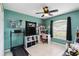 Cozy spare bedroom that could double as a home office and workout area at 4649 72Nd E Ct, Bradenton, FL 34203
