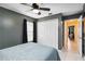 Comfortable bedroom featuring a ceiling fan, closet, and a neutral color scheme for a relaxing ambiance at 4649 72Nd E Ct, Bradenton, FL 34203
