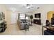 Relaxing living room with vaulted ceiling, tile floors, and stylish furnishings at 4649 72Nd E Ct, Bradenton, FL 34203