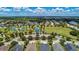 An aerial view of the neighborhood with lush landscaping, sidewalks, and community amenities at 4654 Claremont Park Dr, Bradenton, FL 34211